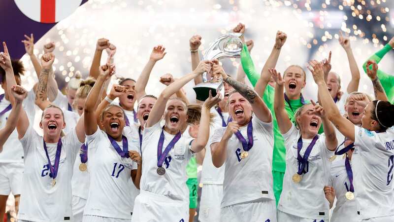 Leah Williamson and Millie Bright of England lift the UEFA Women