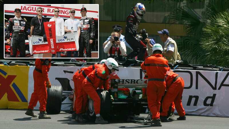 Christian Klien, George Clooney, Brad Pitt, Matt Damon and Mark Webber pose outside the Jaguar garage in Monaco (Image: Getty Images)