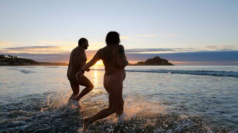 Daryl and Susan enjoying a skinny dip at sunrise (Image: Greg Martin / Cornwall Live)