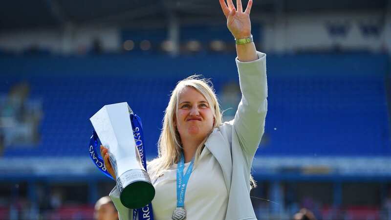 Emma Hayes lifts the WSL trophy after beating Reading 3-0
