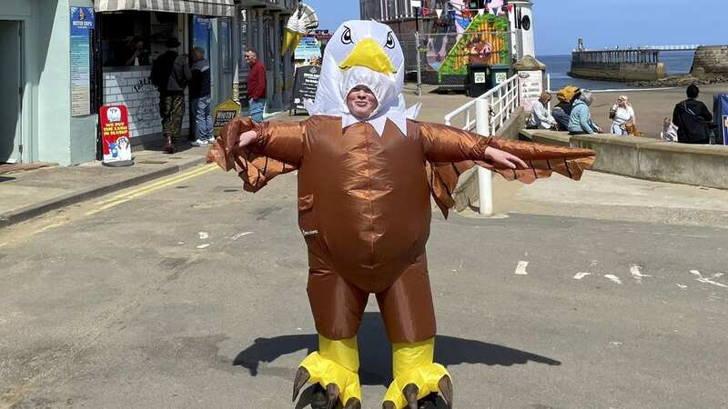 Corey Grieveson in his eagle costume (Image: Alex Boyd / SWNS)