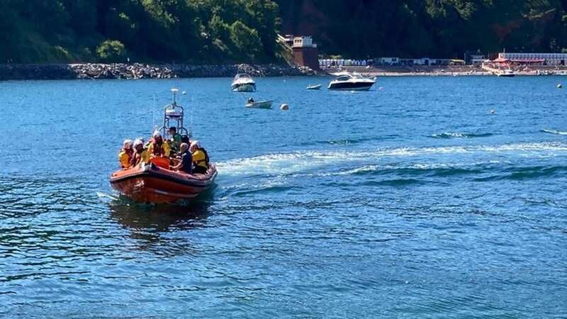 Two men in their 20s dead after being pulled from water off coast