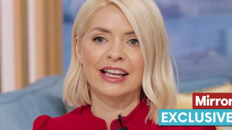 Holly Willoughby is determined to stay on at This Morning and ride out the Phillip Schofield scandal, a source has claimed