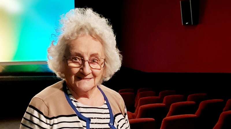 Pauline on her return to the cinema of her youth (Image: Care UK/Glastonbury Court / SWNS)