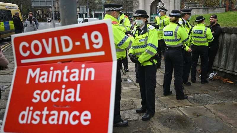 During the Covid pandemic police issued fines for those breaking lockdown rules (Image: AFP via Getty Images)