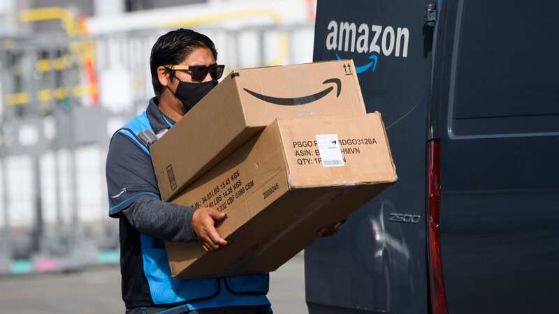 Amazon revenues swelled to a massive £24billion last year (file image) (Image: PATRICK T. FALLON/AFP via Getty Images)