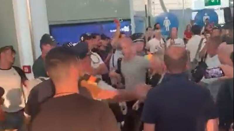Anthony Taylor was attacked by Roma fans in Budapest Airport (Image: Twitter / @MCriscitiello)
