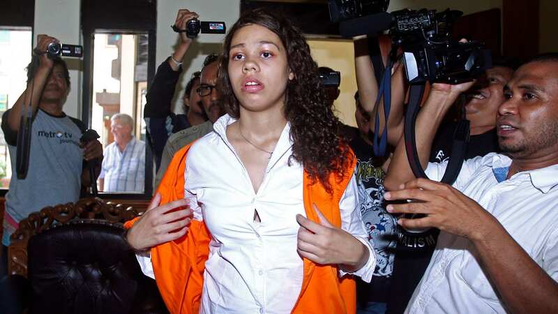 Heather Mack arrives in Chicago and is immediately arrested by U.S. authorities (Image: AP)
