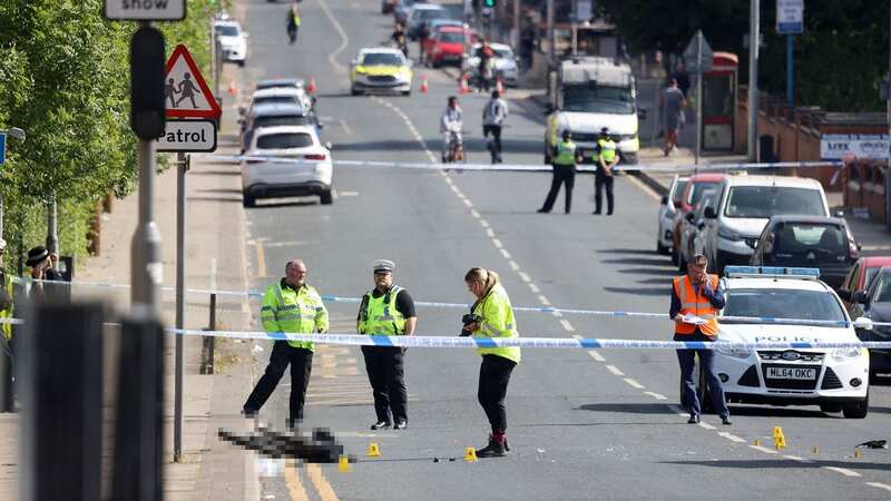 Officers at the scene of the crash in Salford (Image: Sean Handsford / Manchester Evening News)