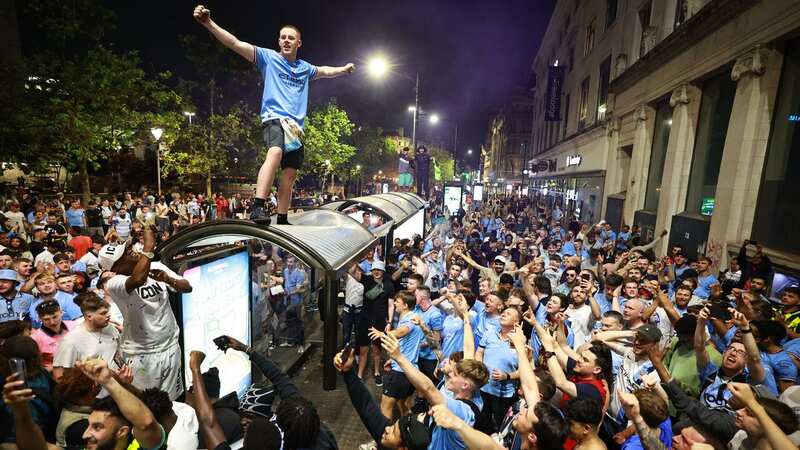 There was a heavy police presence as jubilant Manchester City fans in Piccadilly Gardens celebrated their team