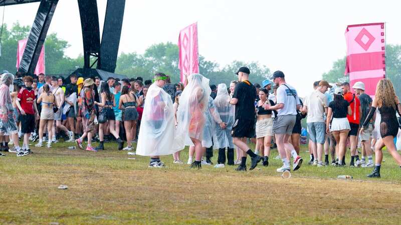 Festival goers endure a thunderstorm at Parklife Festival 2023 (Image: Getty Images)