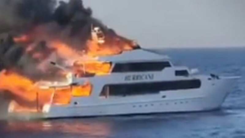 Terrifying moment passengers jump from boat ablaze as three Brits remain missing