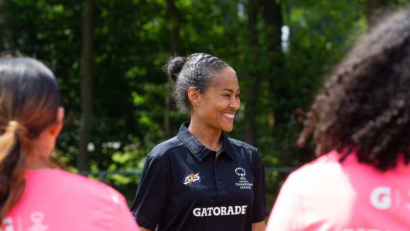 Rachel Yankey talks to a group of young footballers about the barriers she faced growing up