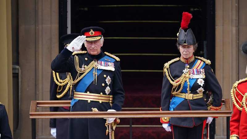 King Charles and Princess Anne during an engagement at Buckingham Palace today (Image: PA)