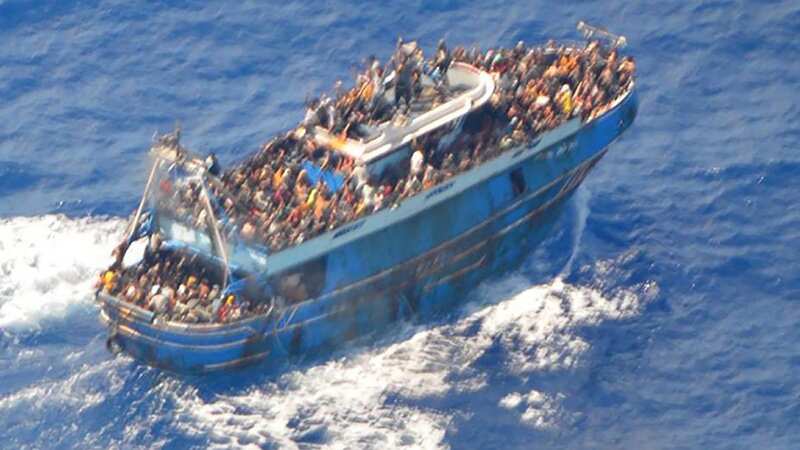 Aerial view taken from a rescue helicopter of migrants onboard the fishing vessel (Image: HELLENIC COASTGUARD/AFP via Gett)