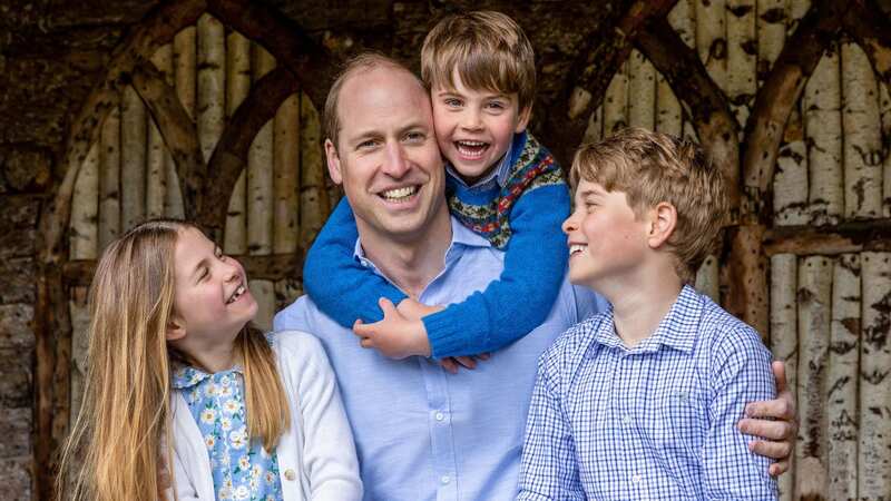 William pictured with his children (Image: PA)