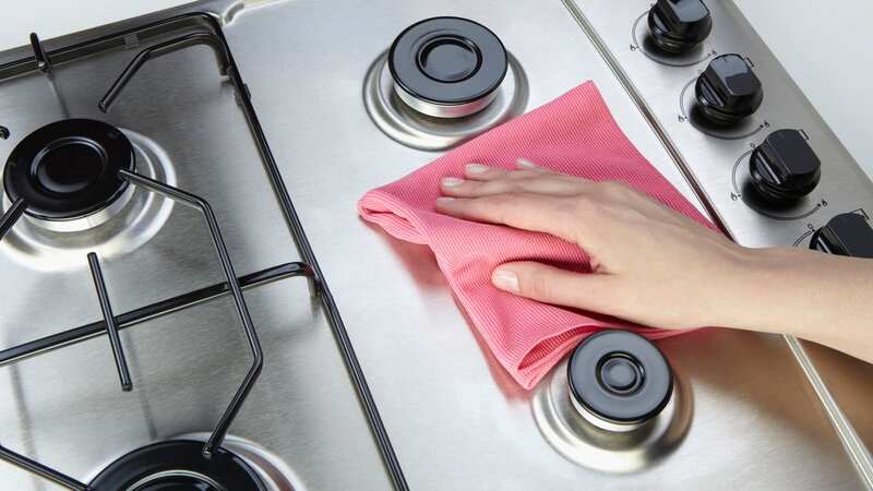 It can be tricky to keep the sides of your stove clean (stock image) (Image: Getty Images)