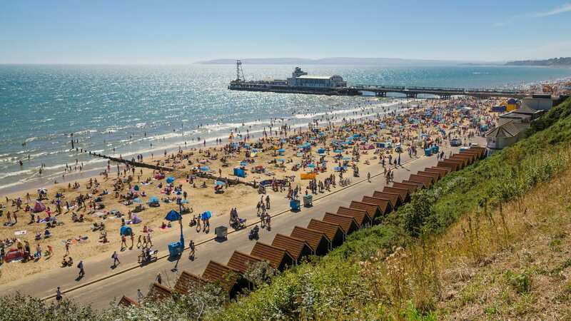 Police want to trace a "group of men" as they believe one of these touched the boy inappropriately in the water at Bournemouth beach (Image: Getty Images)