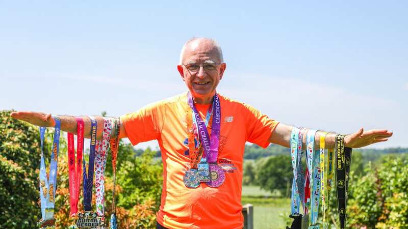 Retiree Martin Ward has racked up 100 medals for running marathons (Image: Joseph Walshe / SWNS)