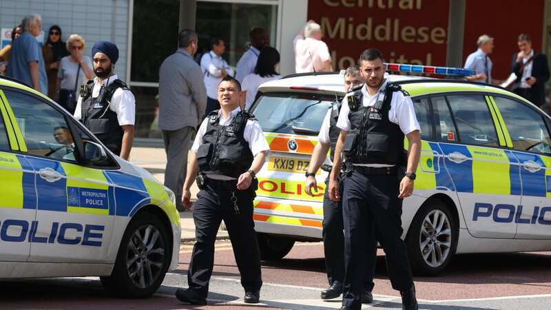 Police at Central Middlesex Hospital today (Image: Ian Vogler / Daily Mirror)