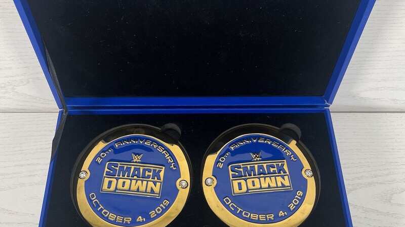 The WWE Smackdown Side Plates in their box worth almost £300 (Image: Jon Luc Greenwood / SWNS)