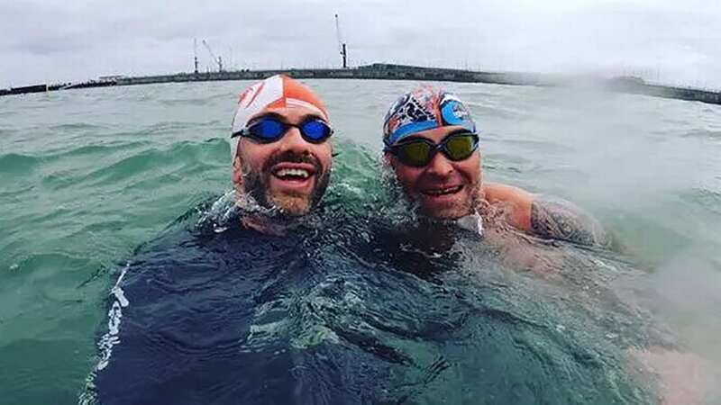 Iain Hughes had set off to swim the English Channel for charity