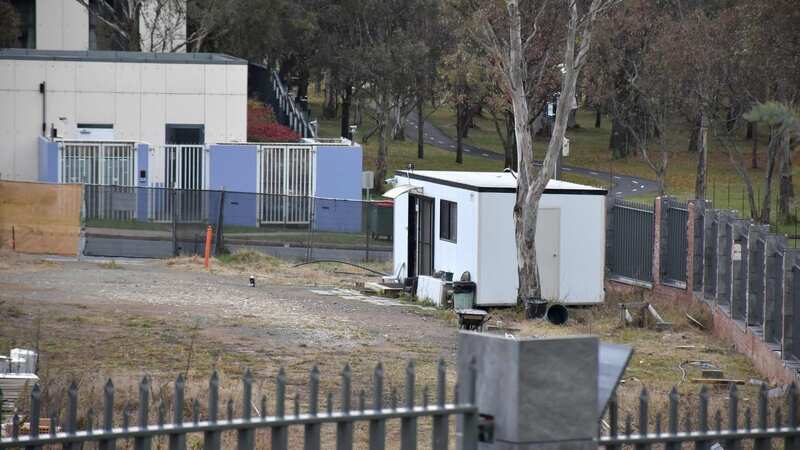 The small cabin in Canberra, Australia at the centre of a potentially multi-million-pound row between the country and the Kremlin (Image: AFP via Getty Images)