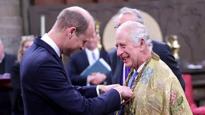 Prince William with King Charles III during the King