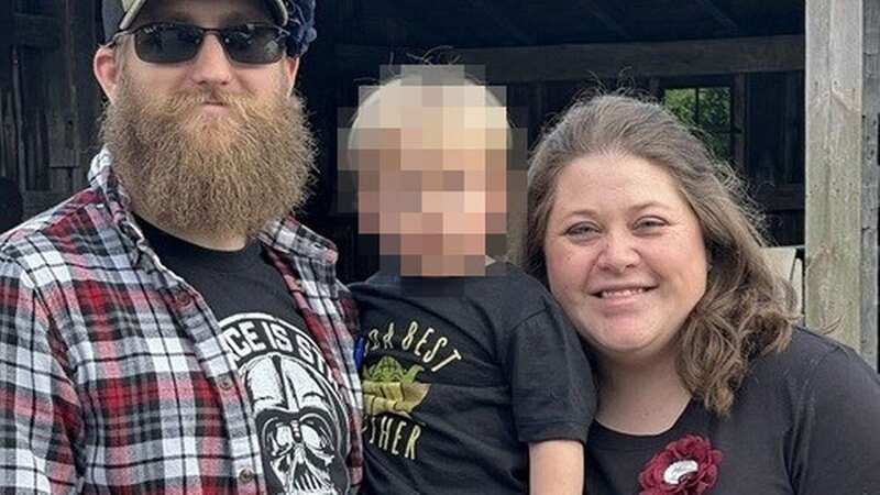 Laura Ilg (right) was accidentally shot and killed by her 2-year-old son (center). They are pictured with her Marine husband Alek (left) (Image: obituaries.norwalkreflector.com)