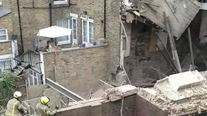 A video had earlier showed a firefighter calling for anyone trapped to make a noise so they could be found before it was confirmed no one was under the rubble