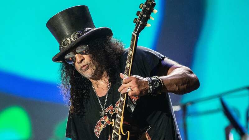 Slash has a surprising reason to wear his hat (Image: EPA-EFE/REX/Shutterstock)