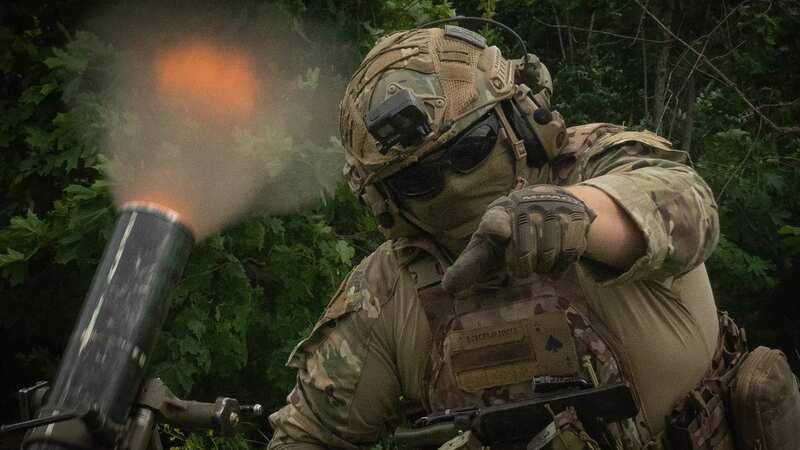 A Ukrainian soldier gestures as he fires towards Russian positions on the frontline in Zaporizhzhia region (Image: AP)