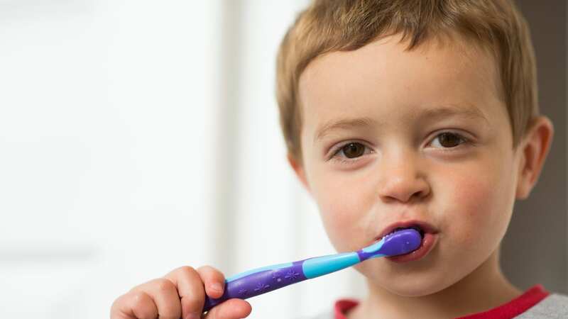 She used to dread brushing his teeth in a morning and on a night (stock photo) (Image: Getty)
