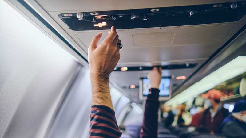 The passenger decided it was a good moment to call the flight attendant over (Image: Getty Images/EyeEm)