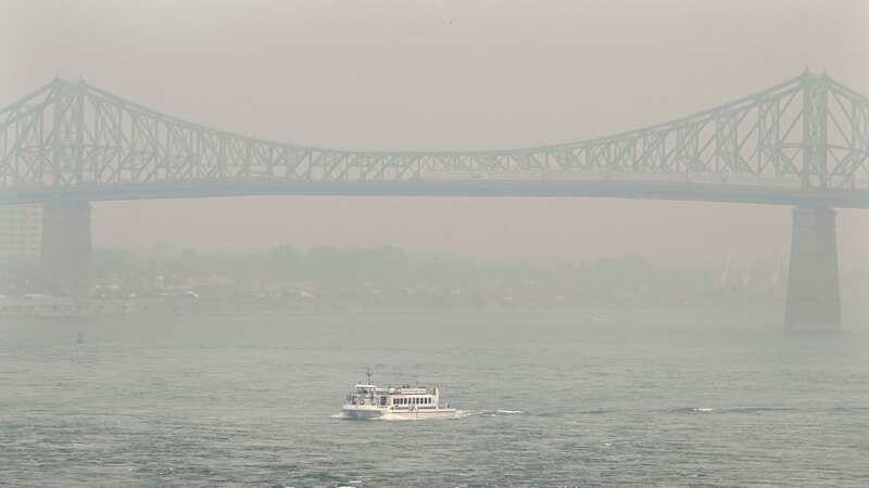 Jacques Cartier bridge obscured by a haze of smog in Montreal (Image: AP)