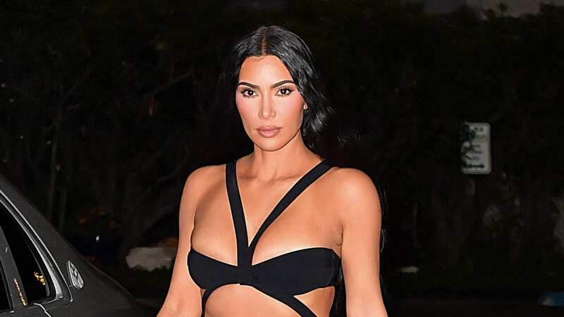Kim Kardashian steals the show in racy black gown at friend