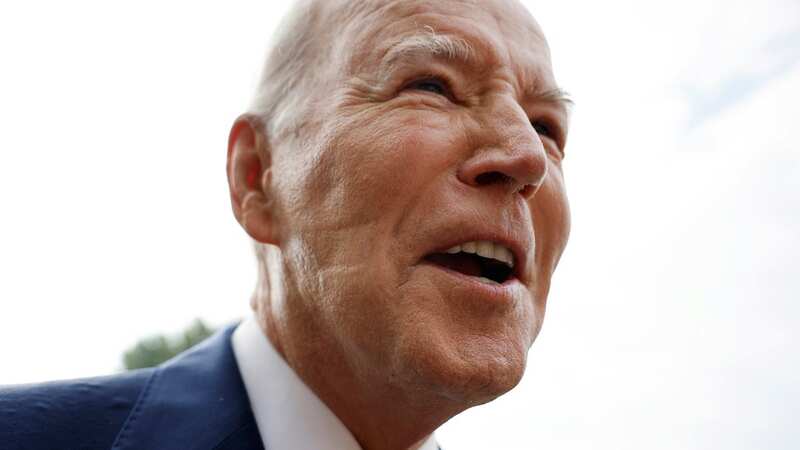 President Joe Biden talks to reporters as he departs the White House (Image: Getty Images)