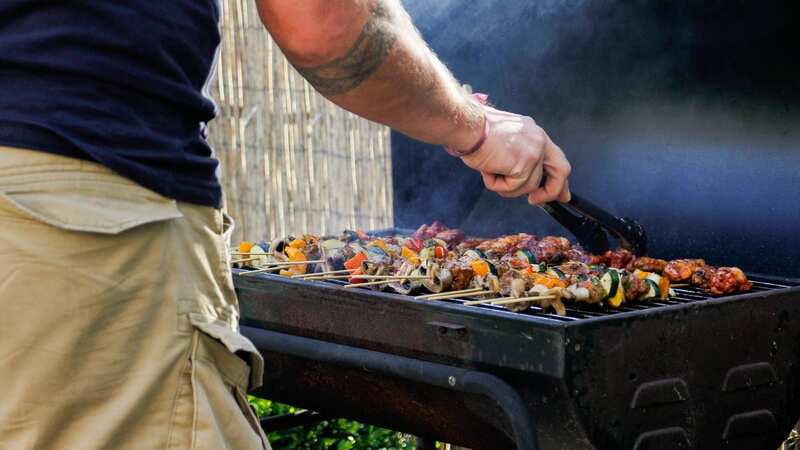 Brits typically attend four barbeques each summer - although some will go to as many as ten (Image: Kinga Krzeminska/Getty Images)
