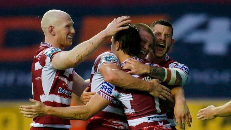 Wigan Warriors players celebrate during their win over Huddersfield Giants (Image: Ed Sykes/SWpix.com)
