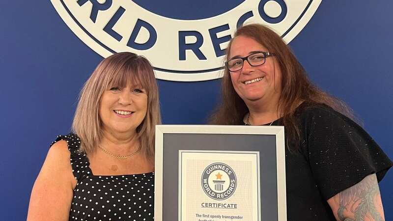 Lucy Clark (right) and her wife, Avril, receiving the Guinness World Record