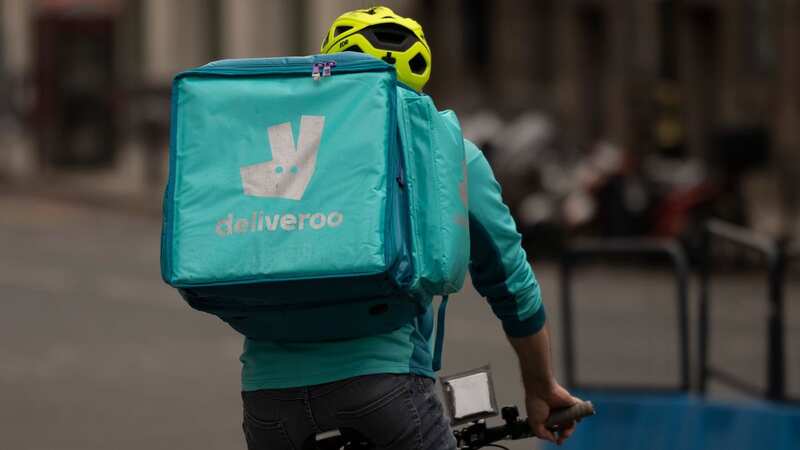 A man in a Deliveroo uniform was stabbed on a UK street (stock image) (Image: Getty Images)