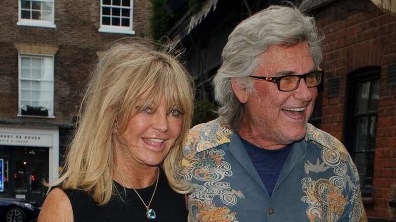 Actress Goldie Hawn and Kurt Russell bump into a friend as they arrive at the Chiltern Firehouse in London. (Image: GAT/GoffPhotos.com)