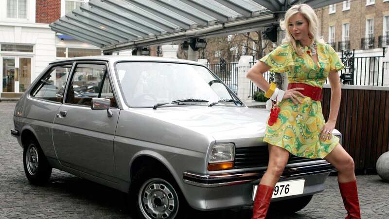 Nell McAndrew poses with an original Mk I Ford Fiesta (Image: UK Press via Getty Images)