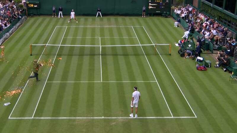 Just Stop Oil protestors disrupt Wimbledon match and cover court with confetti