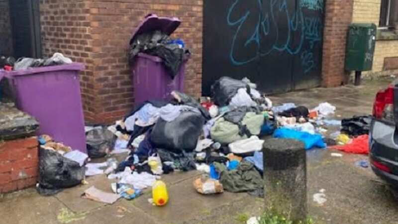 The clothes and food waste overflowing bins in Wavertree, Liverpool