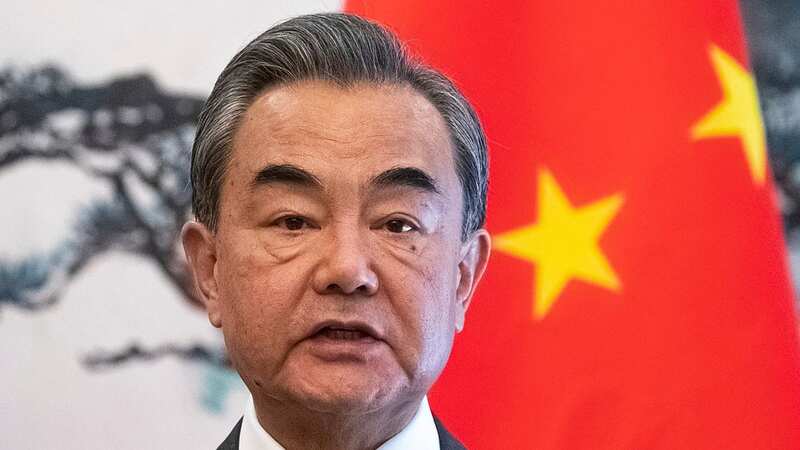 Former Chinese Foreign Minister Wang Yi made racially tinged comments in a ploy to gain support from other East Asian nations (Image: AP)