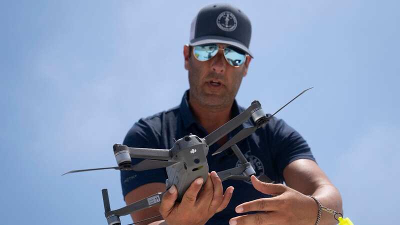 Cary Epstein pilots drones as a preventative measure for shark attacks on Long Island beaches (Image: AP)