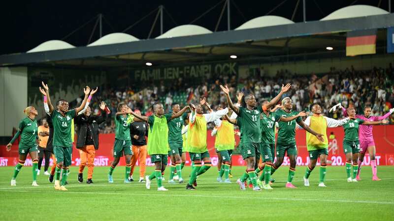 Players of Zambia celebrate after the Women