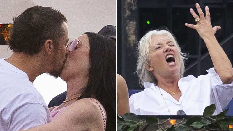 Katy Perry and Orlando Bloom passionately snog at Bruce Springsteen gig as Emma Thompson dances beside them
