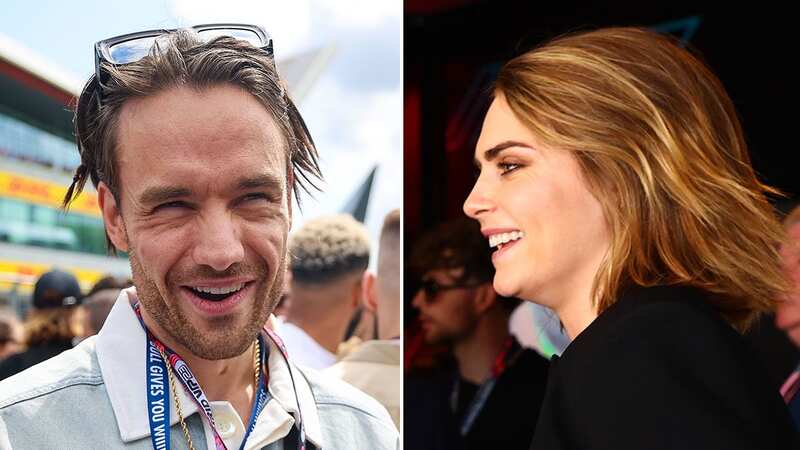 Liam enjoyed a chat with model Cara at Silverstone (Image: Getty)